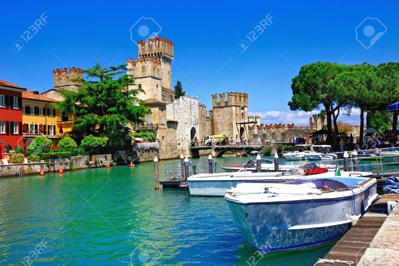 Beautiful Lake Garda, view of Rocca Scaligera in Sirmione village, Italy. - 75154845 Beautiful Lake Garda, view of Rocca Scaligera in Sirmione village, Italy. - 75154845