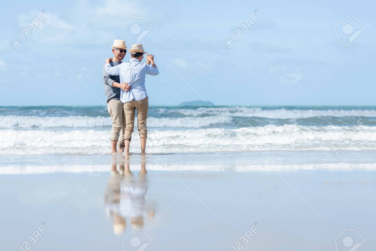 Older Couple On Beach Older Couple On Beach