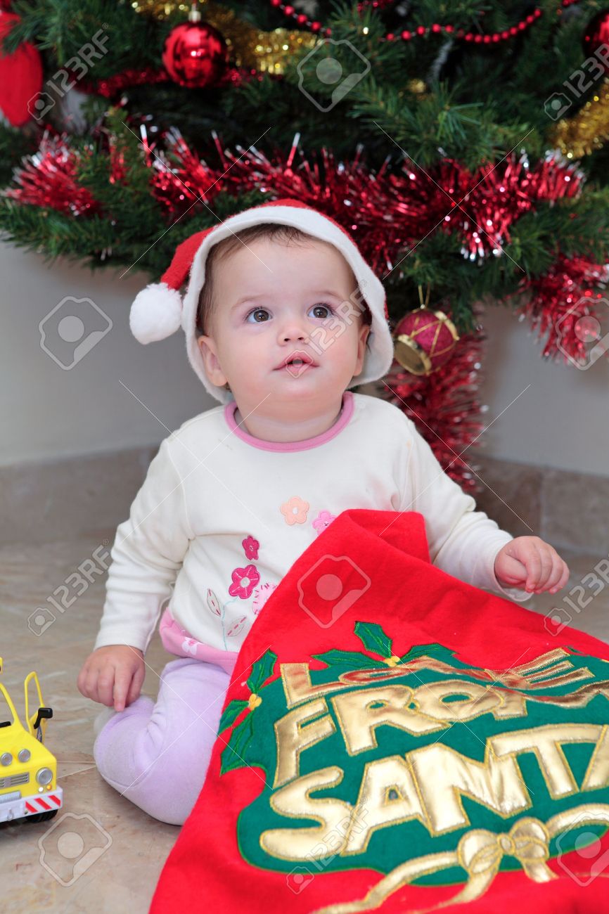 girl opening christmas presents