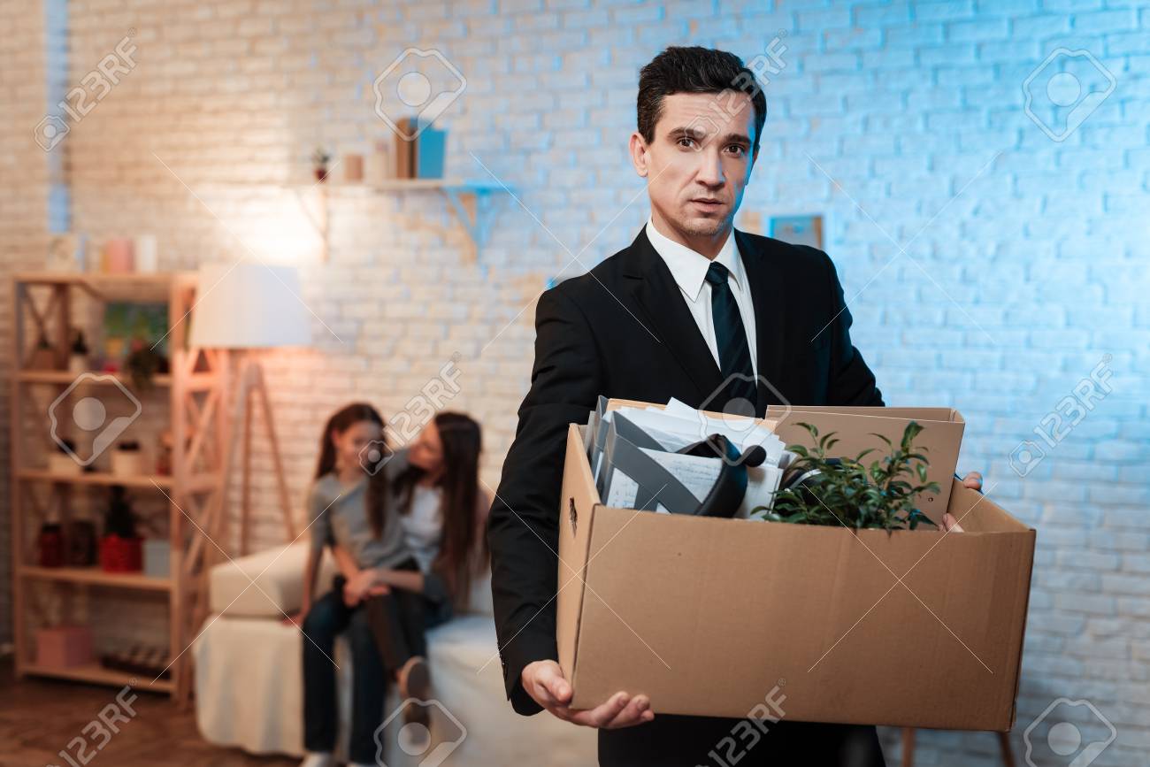 businessman leaves house with