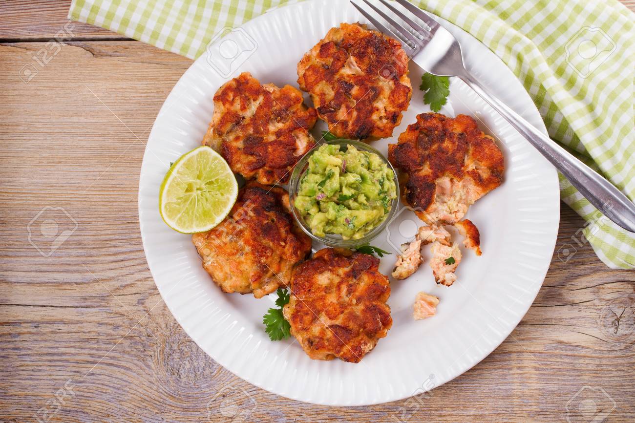 Salmon Burgers With Avocado Salsa Salmon Cakes Stock Photo Picture And Royalty Free Image Image 87595241