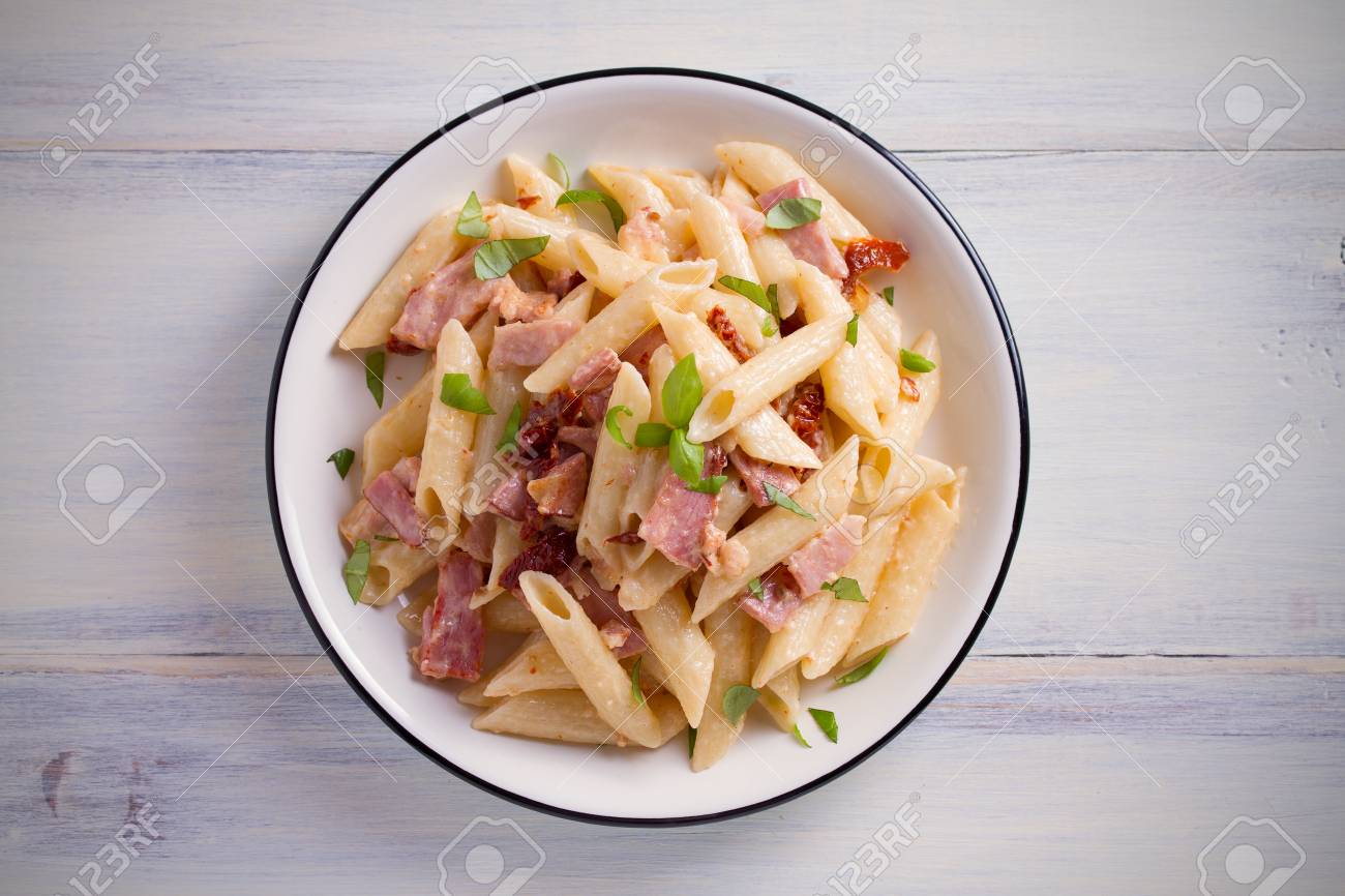Penne Pasta With Bacon And Sundried Tomatoes Alfredo Penne Pasta Stock Photo Picture And Royalty Free Image Image 102027457
