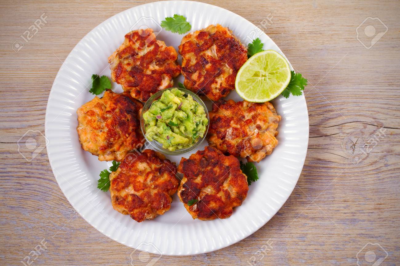 Salmon Burgers With Avocado Salsa And Lime Salmon Cakes Fish Stock Photo Picture And Royalty Free Image Image 113078320