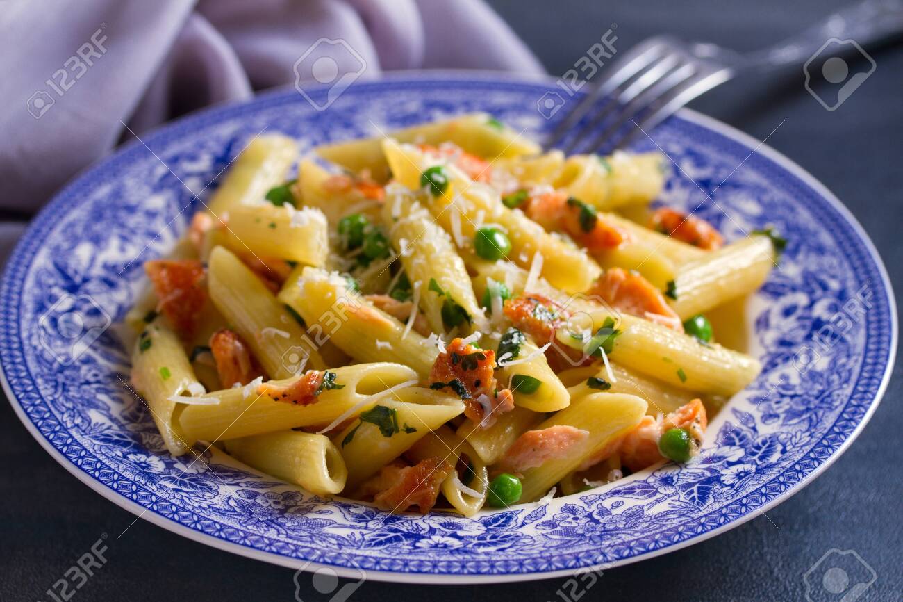 Creamy Salmon Penne Pasta With Green Peas Stock Photo Picture And Royalty Free Image Image 134526636