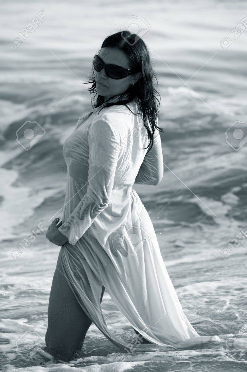 The Girl In A Wet Dress In Sea. Gold Sand. Bulgaria Stock Photo, Picture  and Royalty Free Image. Image 4041519., image size:866x1300