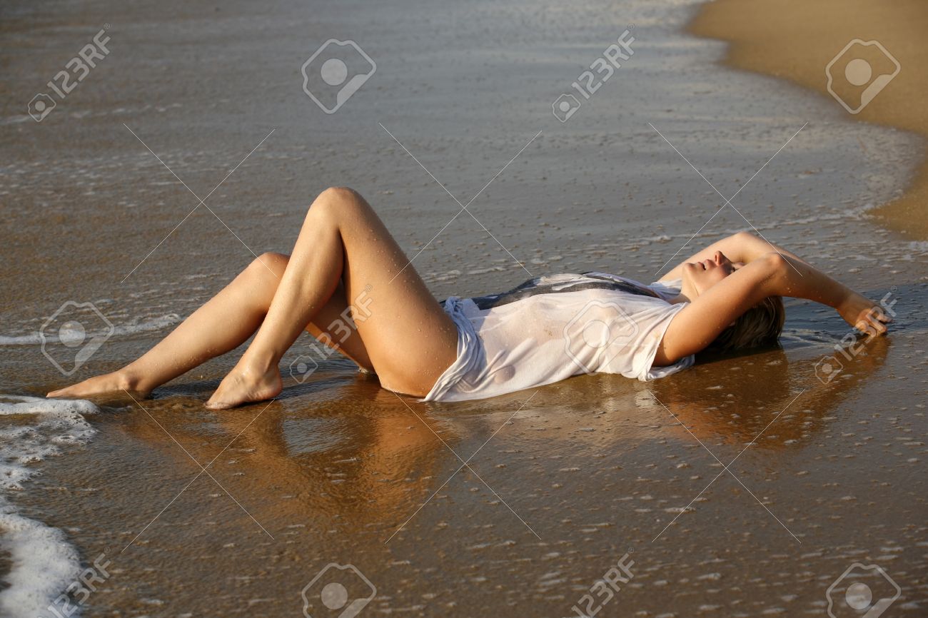 The Girl In A Wet Dress At Coast Of The Sea. Gold Sand. Bulgaria Stock  Photo, Picture and Royalty Free Image. Image 10207609., image size:1300x866