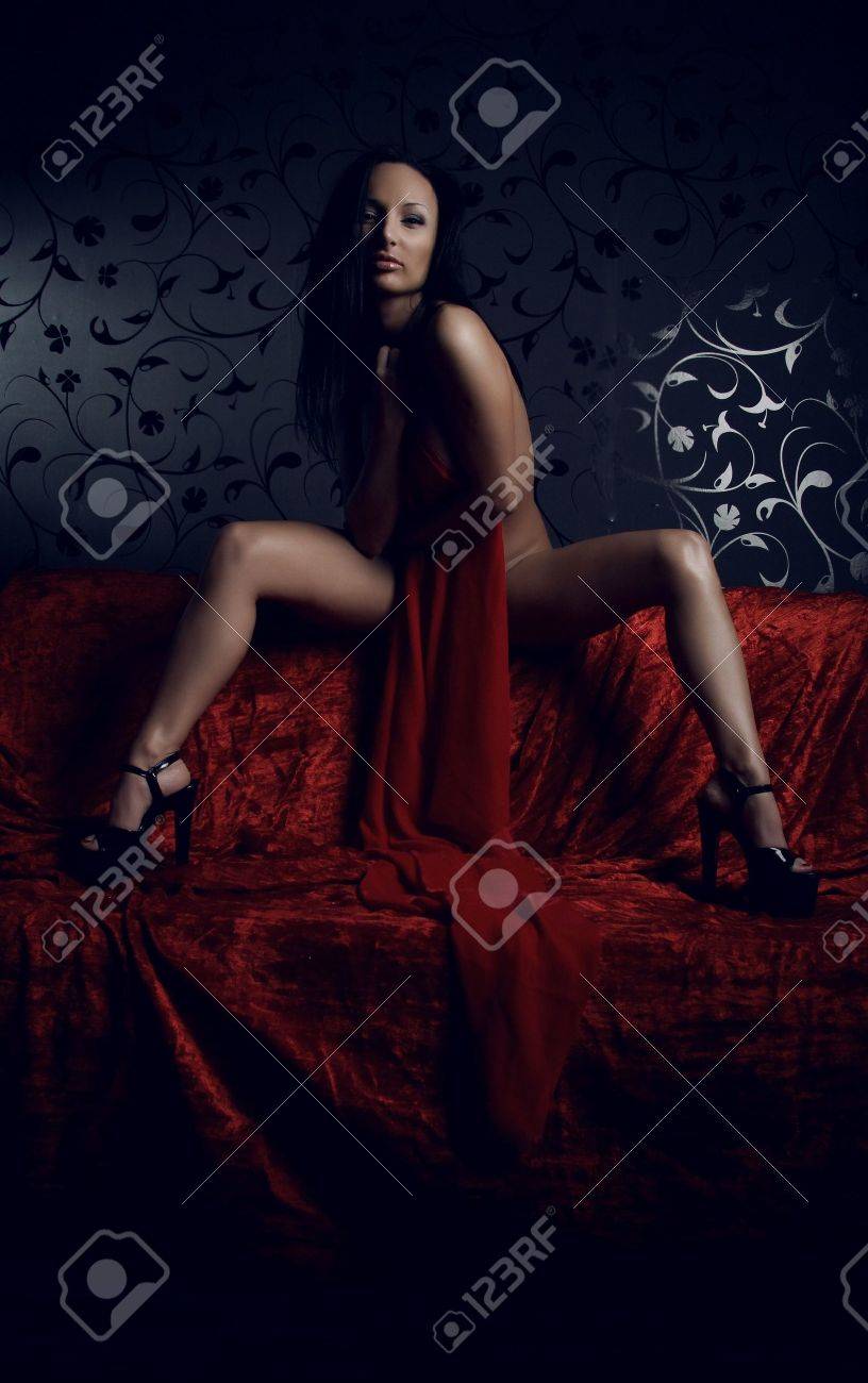 very sexy woman covered with red silk sheet stock photo picture and red silk sheet