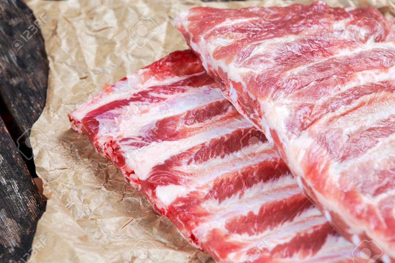 Fresh Raw Pork Ribs On Crumpled Paper Stock Photo Picture And Royalty Free Image Image 63237769
