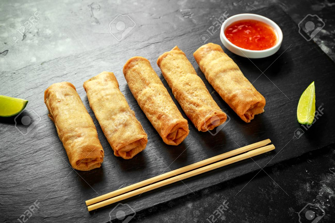 Chinese Vegetable Spring Rolls With Lime Wedges Sweet Chilli Stock Photo Picture And Royalty Free Image Image 97018141