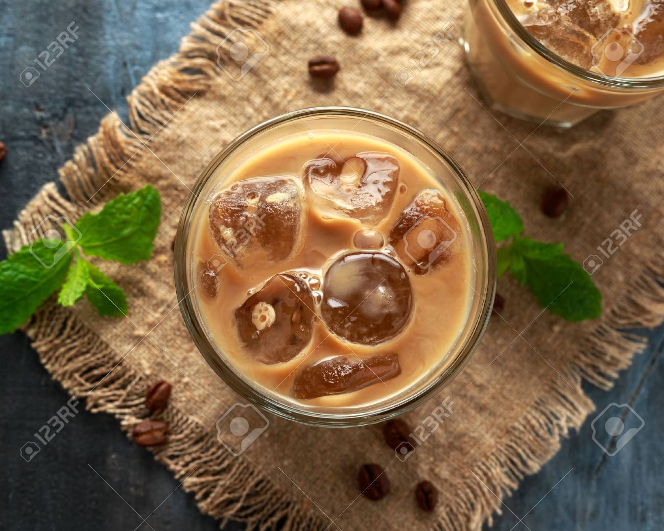 iced latte coffee in a glass with cold milk. Summer drink - 120741901 iced latte coffee in a glass with cold milk. Summer drink - 120741901