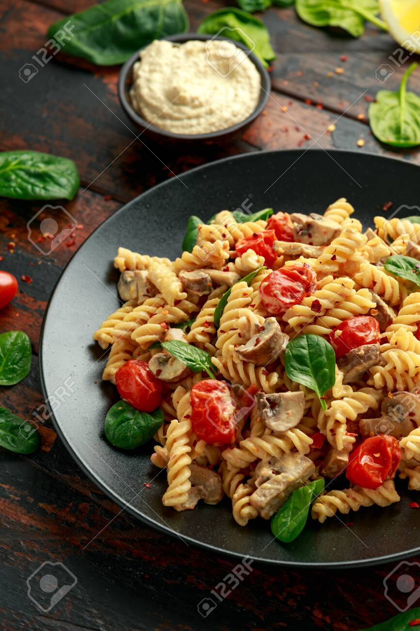 Healthy Creamy Hummus Pasta With Mushroom And Roast Tomatoes Stock Photo Picture And Royalty Free Image Image 141024679