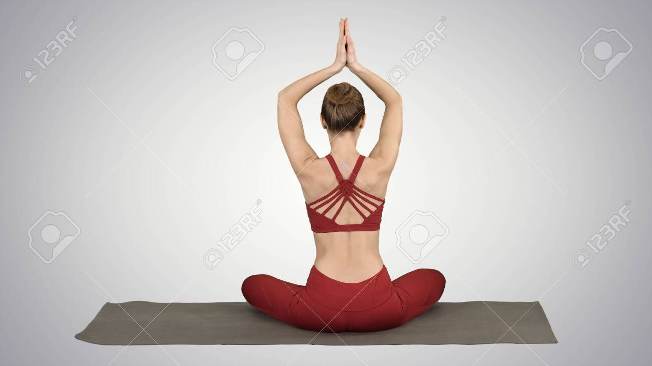 Lotus Pose With Hands Over Head Lotus Pose With Hands Over Head