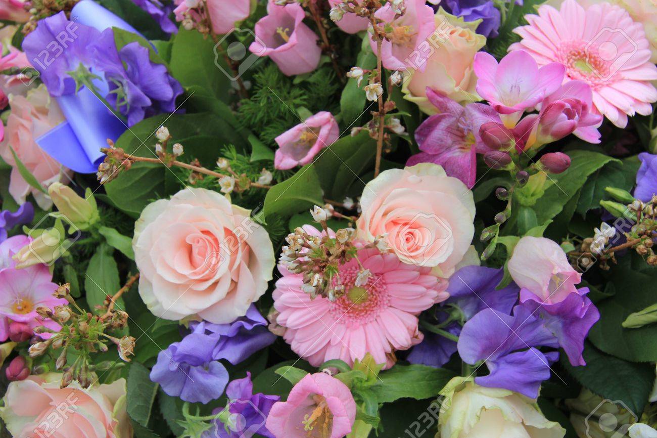 Various flowers in a mixed pink floral arrangement - 16000990 Various flowers in a mixed pink floral arrangement - 16000990