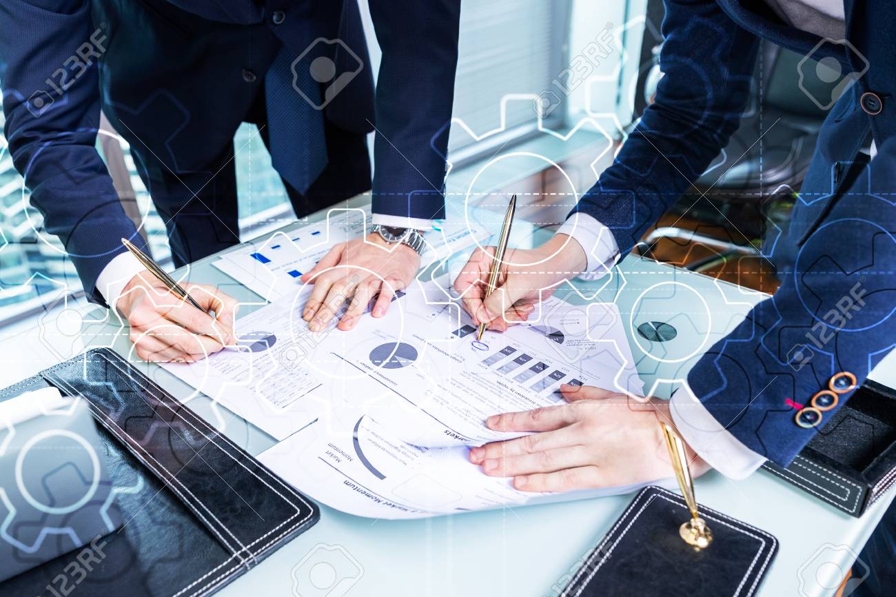 Double exposure gears mechanism on blurred background. Business and industrial process automation concept. - 107994149 Double exposure gears mechanism on blurred background. Business and industrial process automation concept. - 107994149
