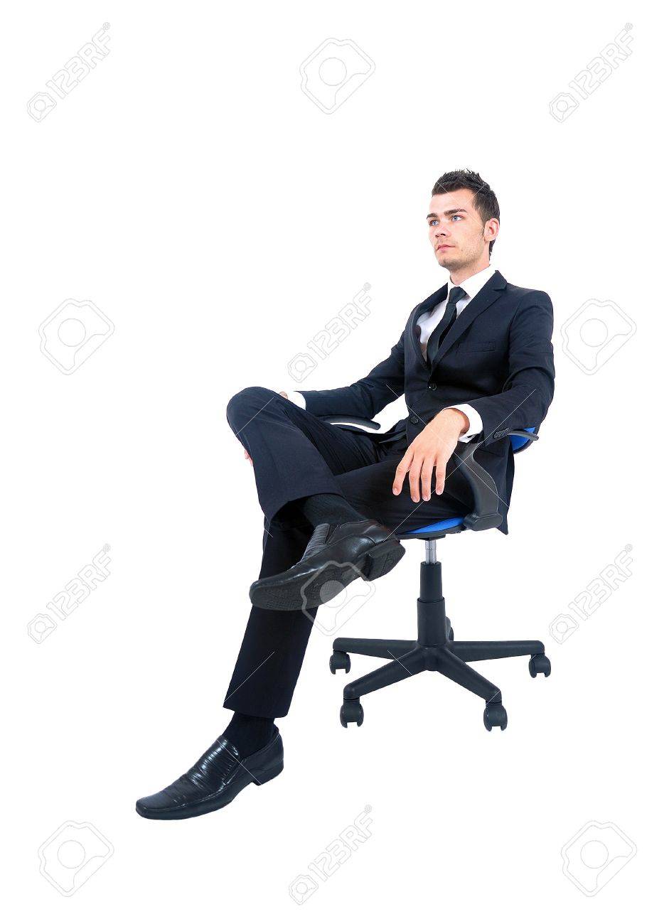 椅子の上に立っている孤立した若いビジネス人 の写真素材 画像素材 Image