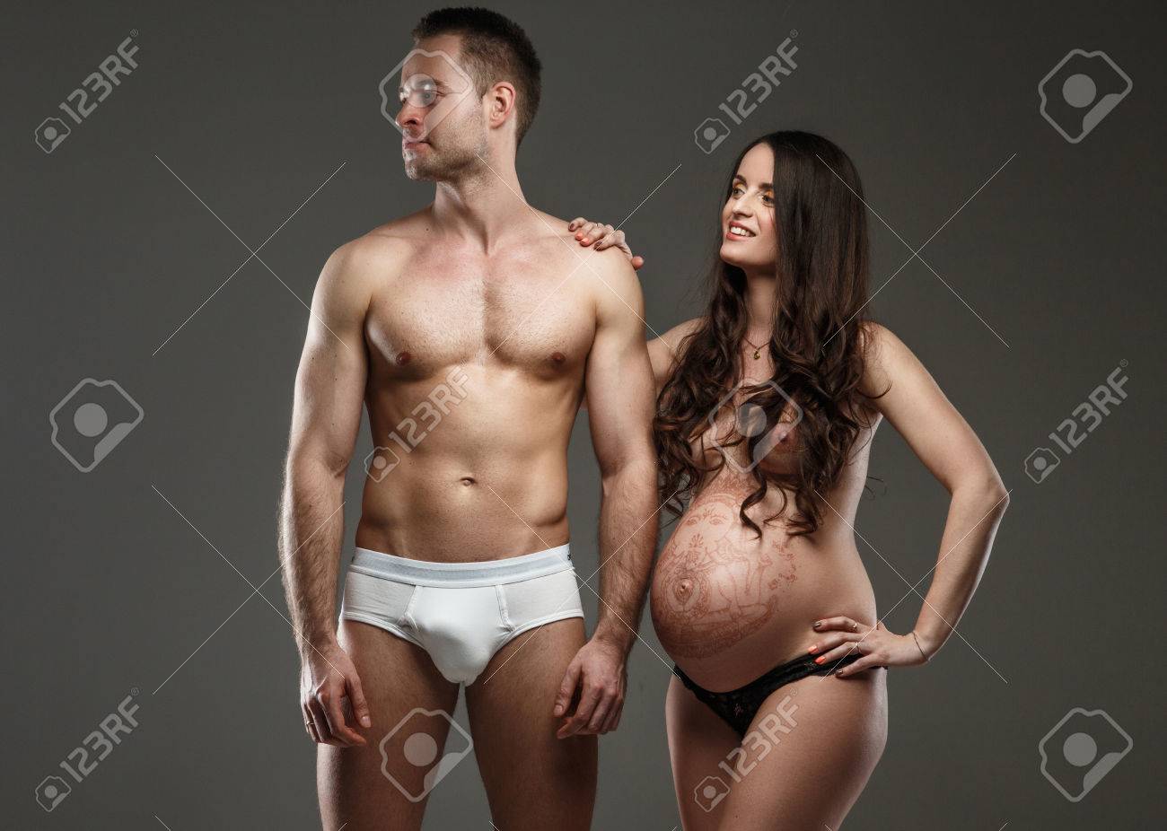 Vladimir PoplavskisTopless Pregnant Woman Posing With Her pic