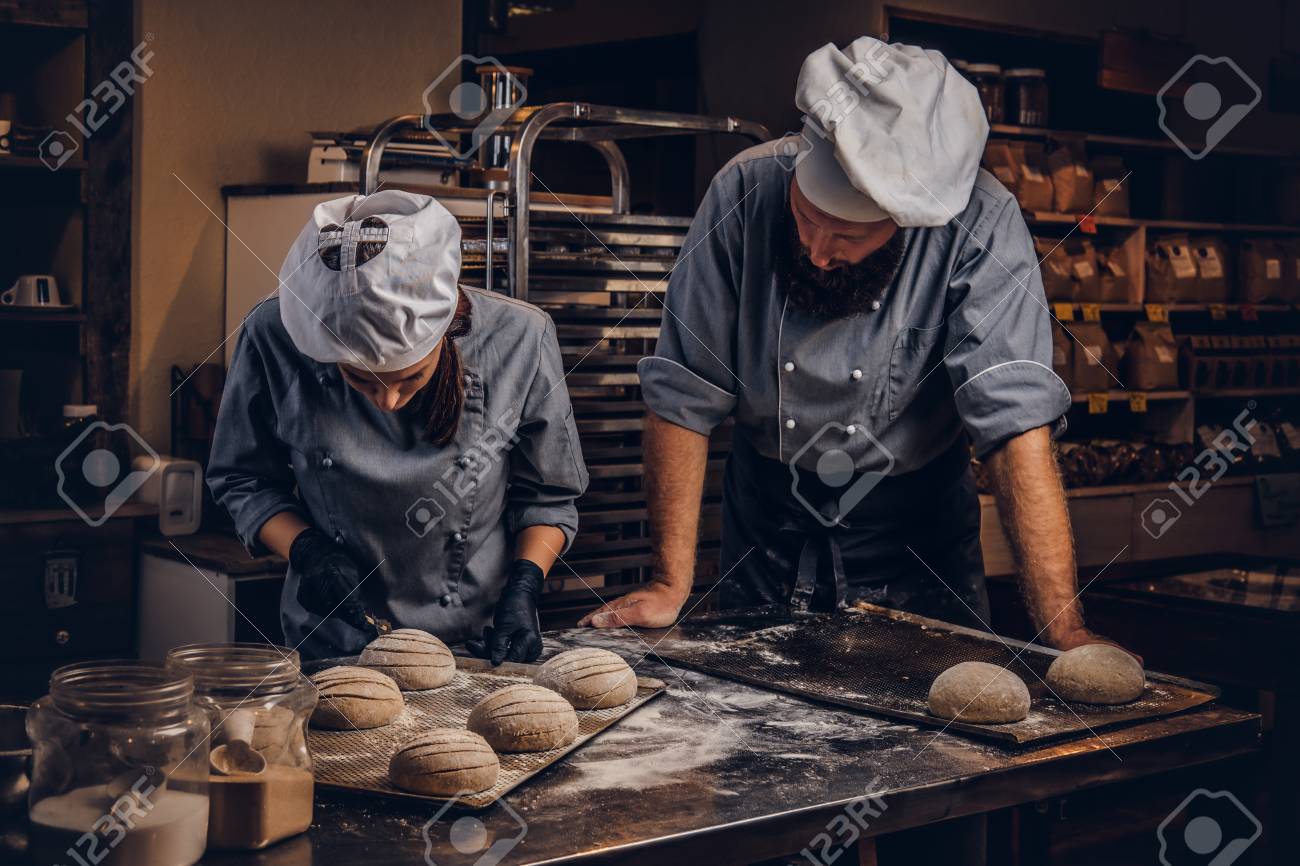 cooking master class in bakery chef with his assistant showing free baking samples