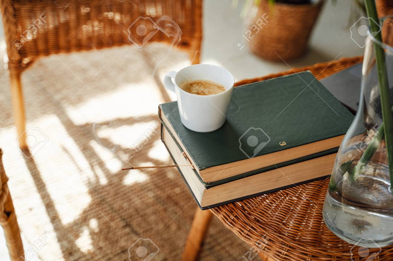 Warm And Soft Apartment In Daytime And Coffee Cup With Book On Stock Photo Picture And Royalty Free Image Image 157988828