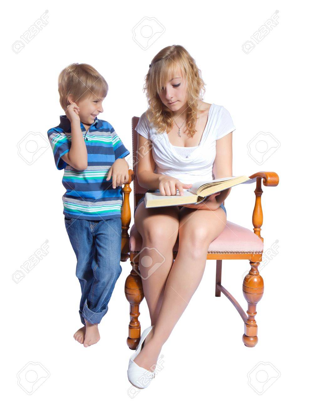 http://previews.123rf.com/images/g215/g2151208/g215120800006/14663180-Young-woman-and-boy-reading-a-book-Isolate-on-white-background-Stock-Photo.jpg