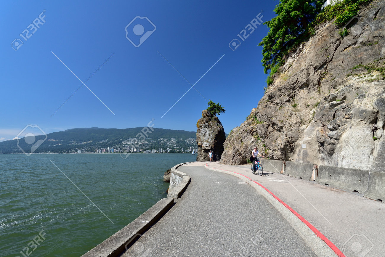 VANCOUVER, BRITISH COLUMBIA, CANADA, MAY 31, 2019: Siwash Rock, a famous rock outcropping in Vancouver - 161070540 VANCOUVER, BRITISH COLUMBIA, CANADA, MAY 31, 2019: Siwash Rock, a famous rock outcropping in Vancouver - 161070540