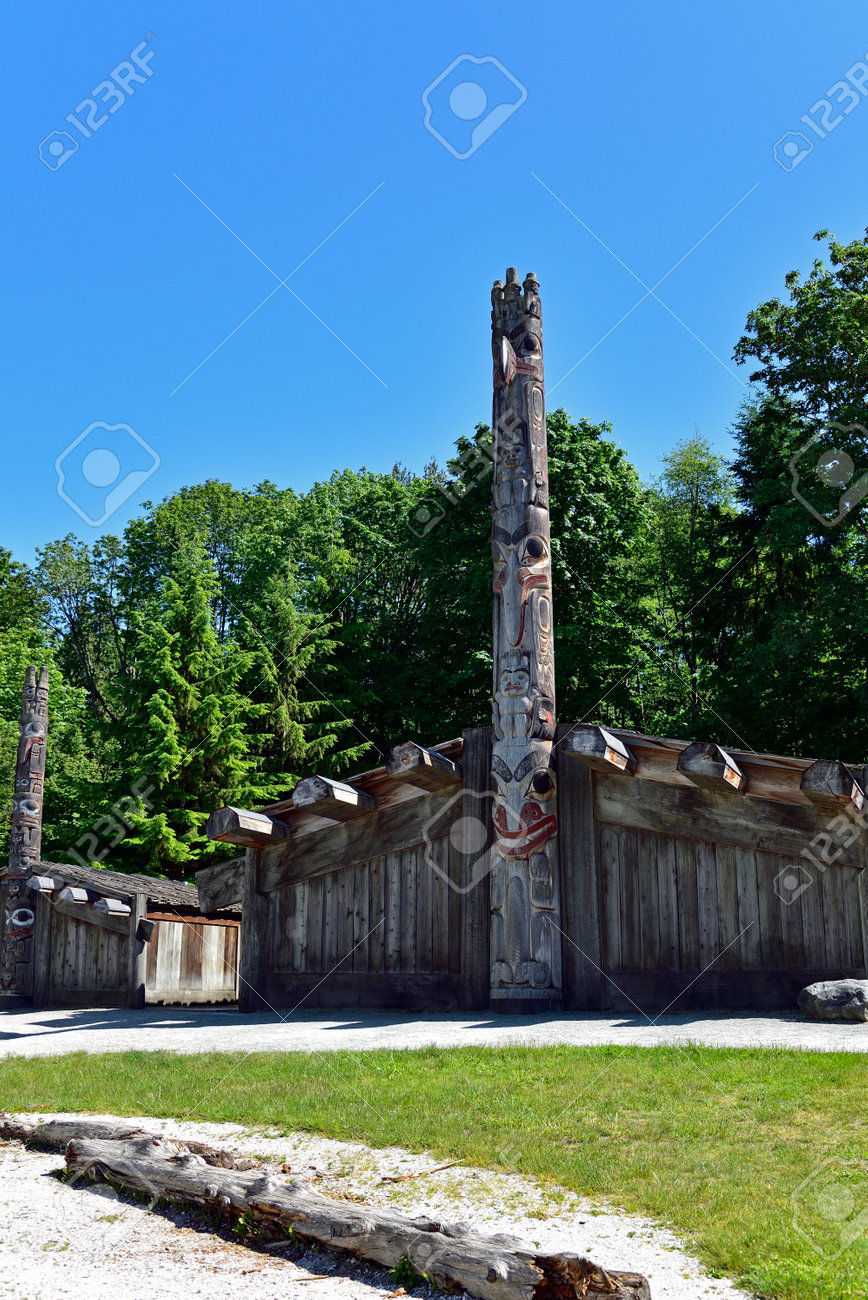 VANCOUVER, BC, CANADA, JUNE 03, 2019: First Nations totem poles and Haida houses in Museum of Anthropology at the University of British Columbia UBC campus in Vancouver - 161070548 VANCOUVER, BC, CANADA, JUNE 03, 2019: First Nations totem poles and Haida houses in Museum of Anthropology at the University of British Columbia UBC campus in Vancouver - 161070548