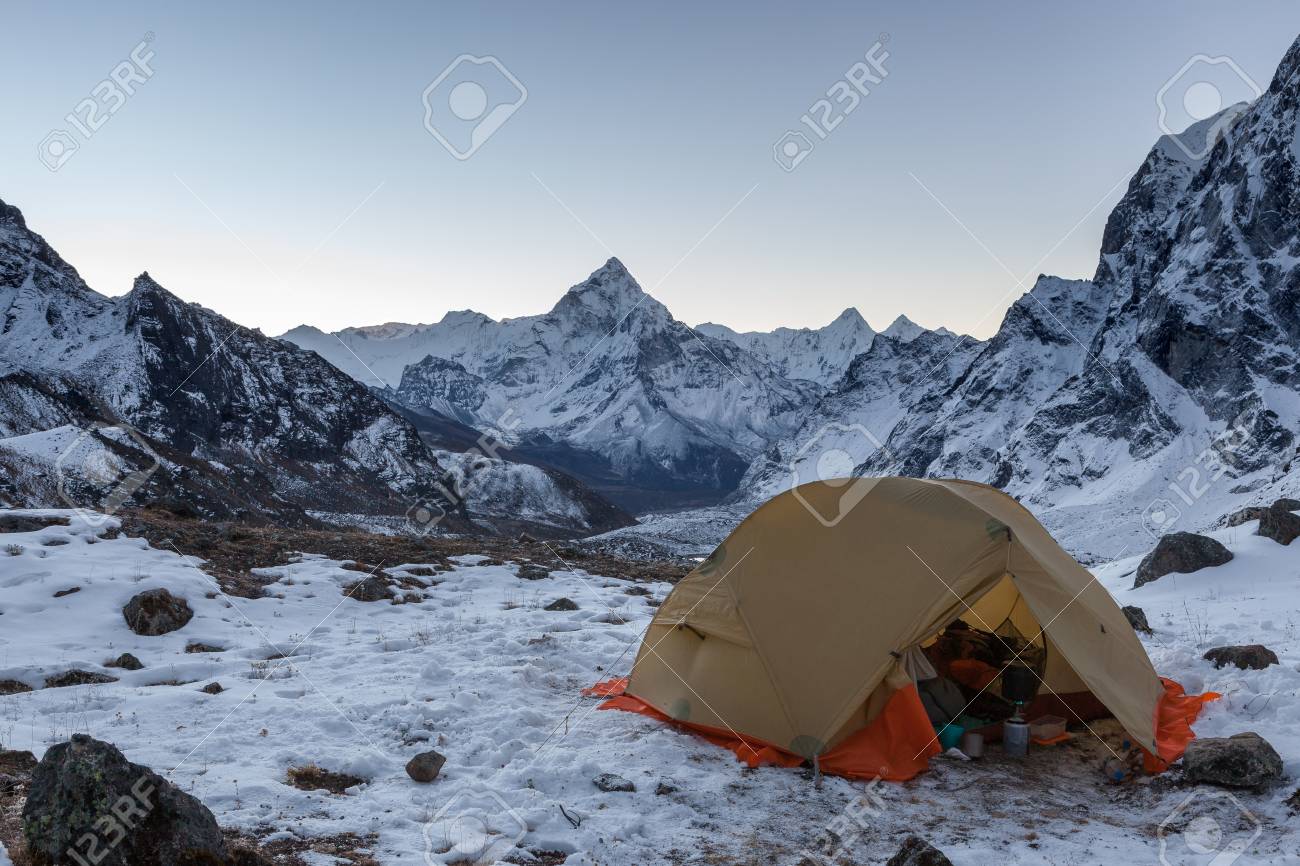 Open Camping Tent With Kitchen Stuff In Snowy Mountains With Snowy Peak Of Ama Dablam On The Background In Himalayas Nepal Extreme Mountain Camping And Outdoor Survival Cooking Concepts Stock Photo Picture