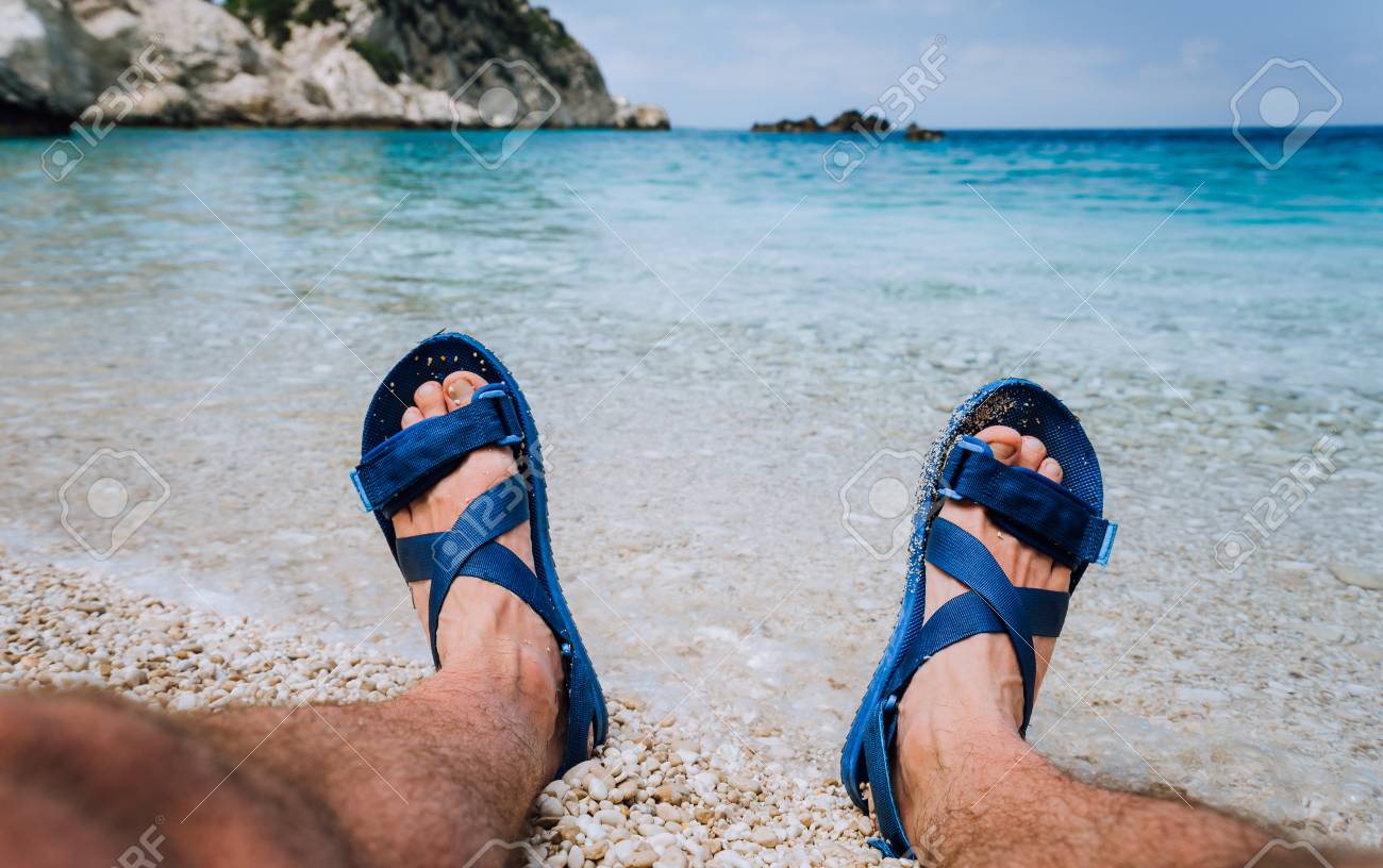 male feet in flip flops
