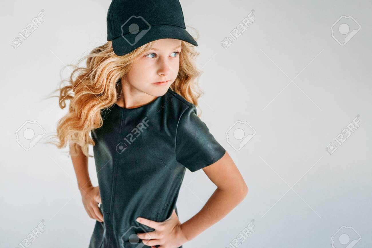 curly hair with baseball cap