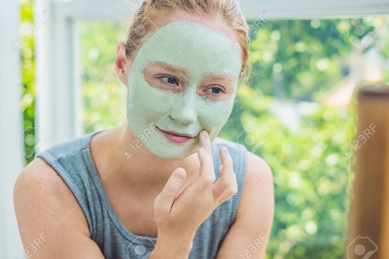 Download Spa Woman Applying Facial Green Clay Mask Beauty Treatments Stock Photo Picture And Royalty Free Image Image 82194168 PSD Mockup Templates