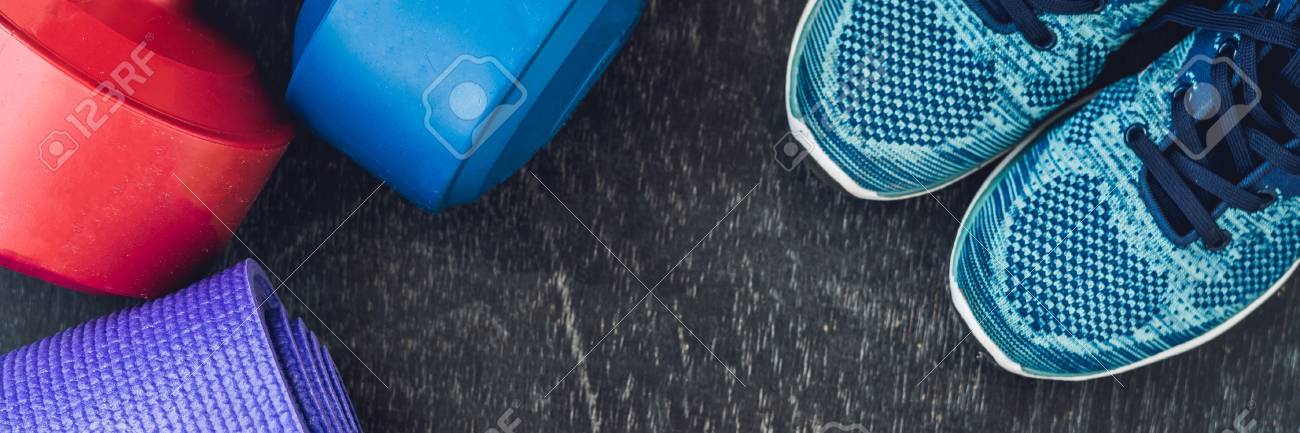 Banner Yoga Mat Sport Shoes Dumbbells And Bottle Of Water On