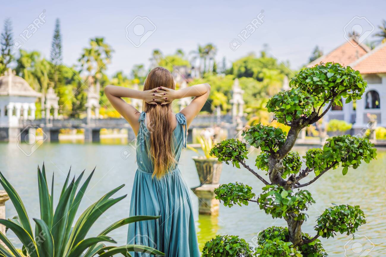 Young Woman In Dress In Water Palace Soekasada Taman Ujung Ruins