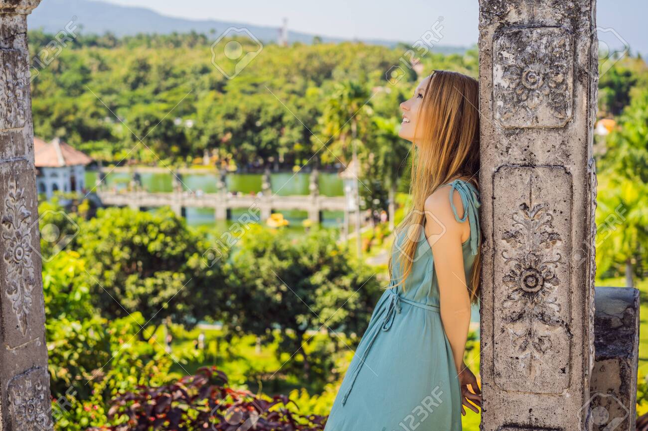 Young Woman In Dress In Water Palace Soekasada Taman Ujung Ruins