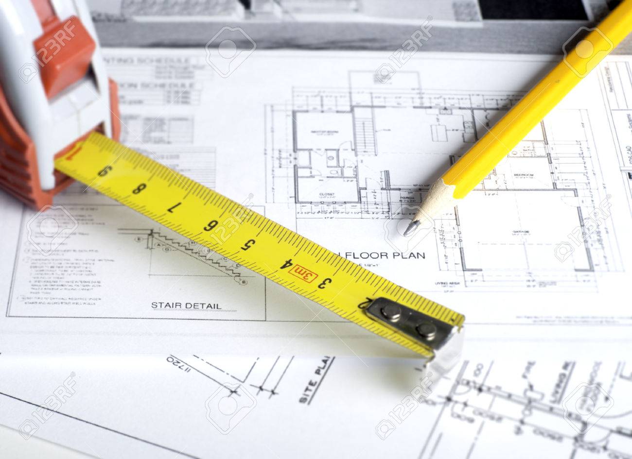 Construction planning drawings on the table and two yellow pencils - 35682736 Construction planning drawings on the table and two yellow pencils - 35682736