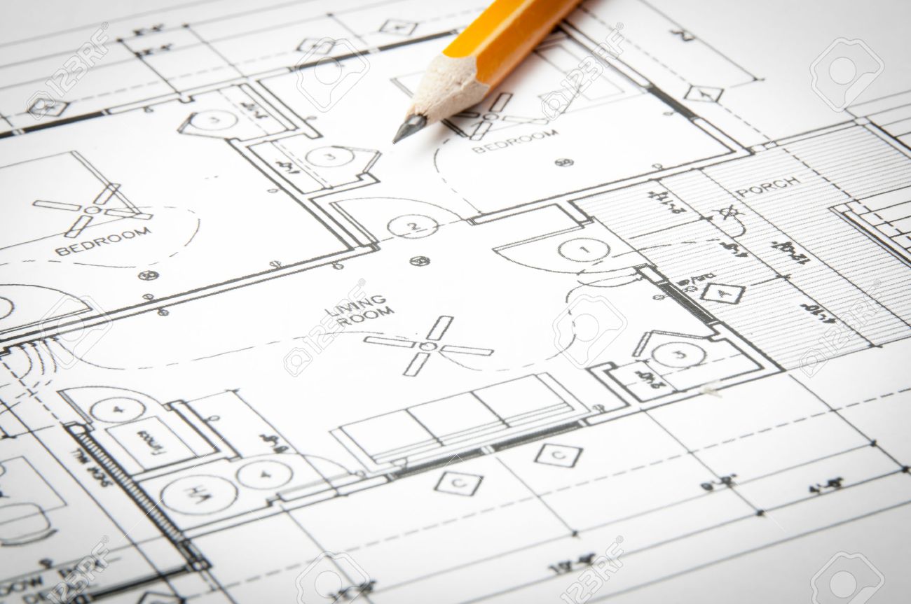 Construction planning drawings on the table and two yellow pencils - 35683355 Construction planning drawings on the table and two yellow pencils - 35683355