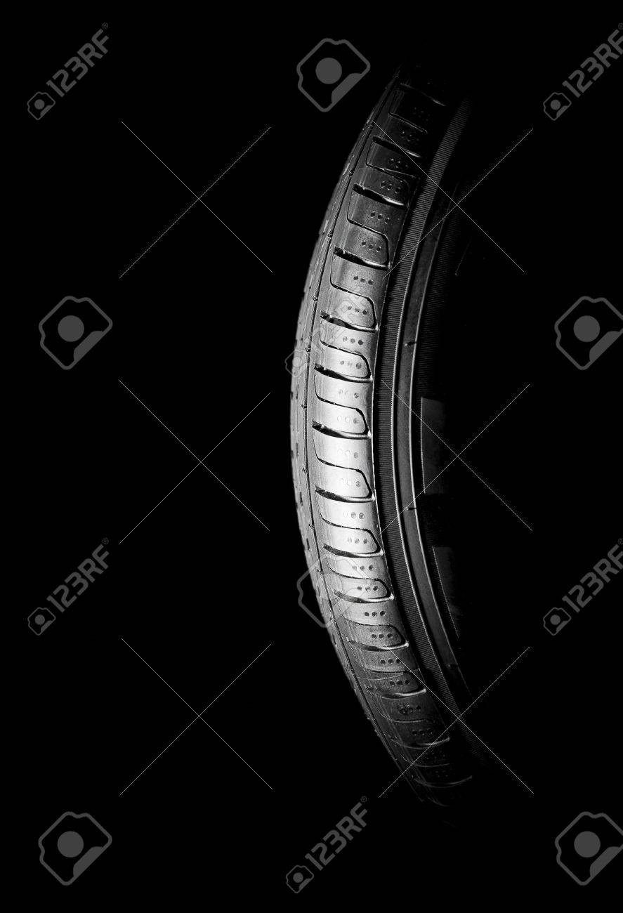 Car tires close-up Winter wheel profile structure on black background - 57201462 Car tires close-up Winter wheel profile structure on black background - 57201462