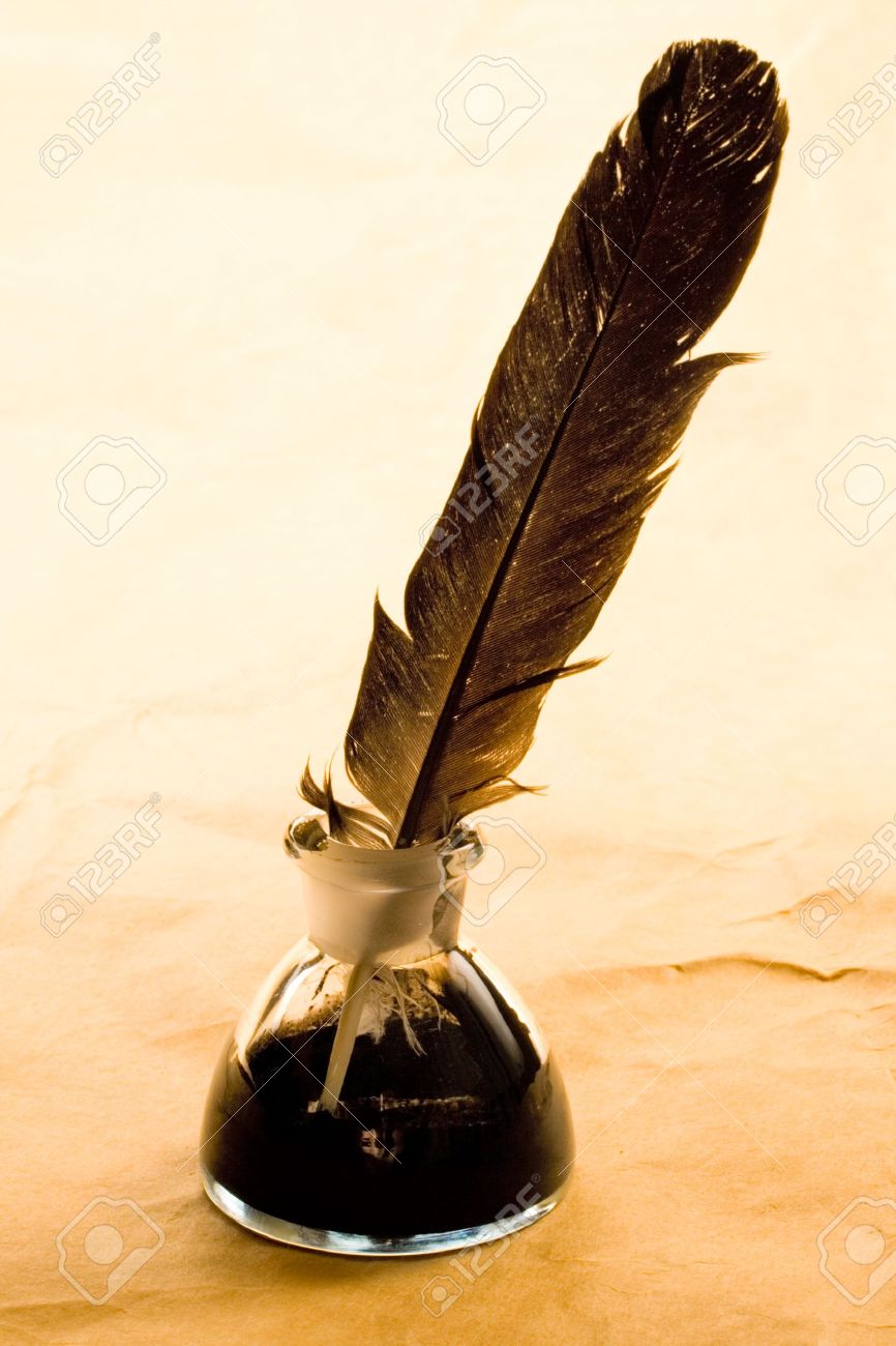 Feather And Ink Bottle Isolated On 