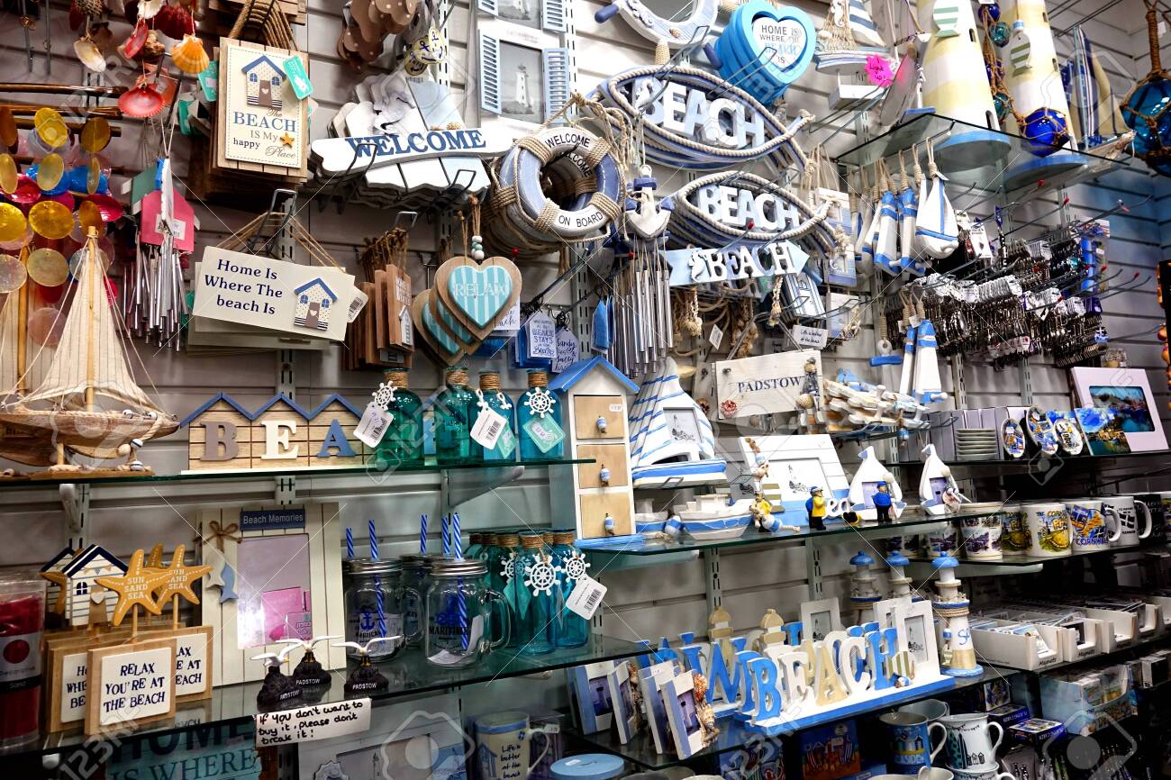 Padstow, Cornwall, April 11Th 2018: Selection Of Seaside, Beach Or Coast  Related Gift Items In A Shop Display Stock Photo, Picture And Royalty Free  Image. Image 118606438.