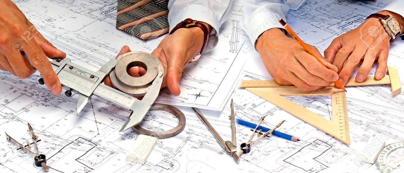 teamwork in engineering designing lizenzfreie fotos bilder und engineering and designing