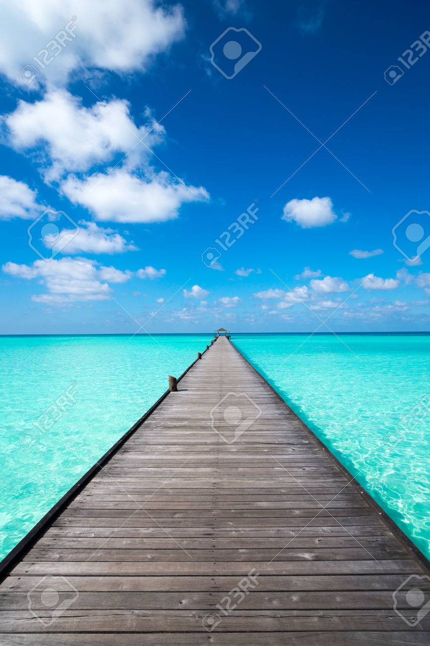 Wooden pier with blue sea and sky background - 44232839 Wooden pier with blue sea and sky background - 44232839