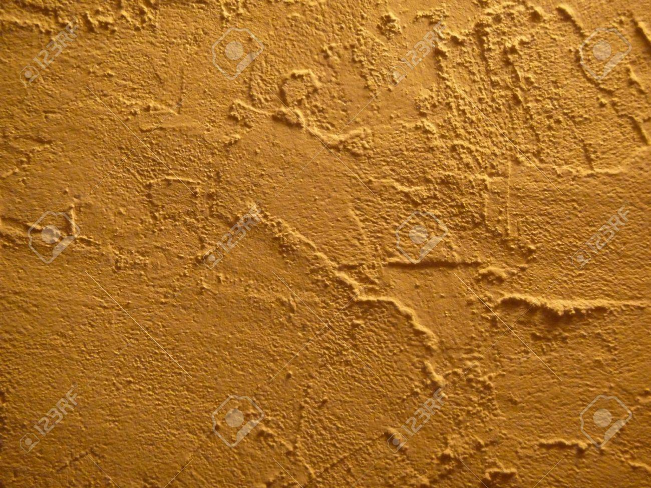 Textured Wall Surface Painted With Yellow Paint Stock Photo ...