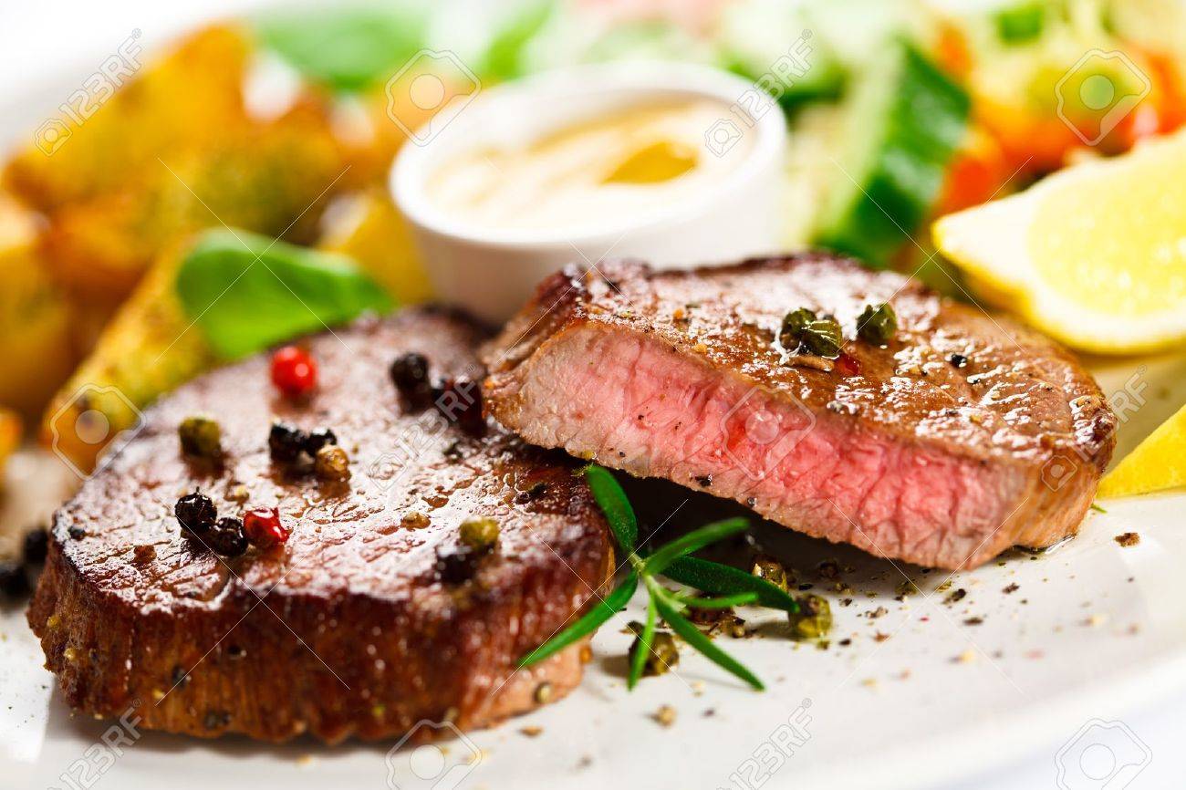 Grilled steak, baked potatoes and vegetables - 22156434 Grilled steak, baked potatoes and vegetables - 22156434