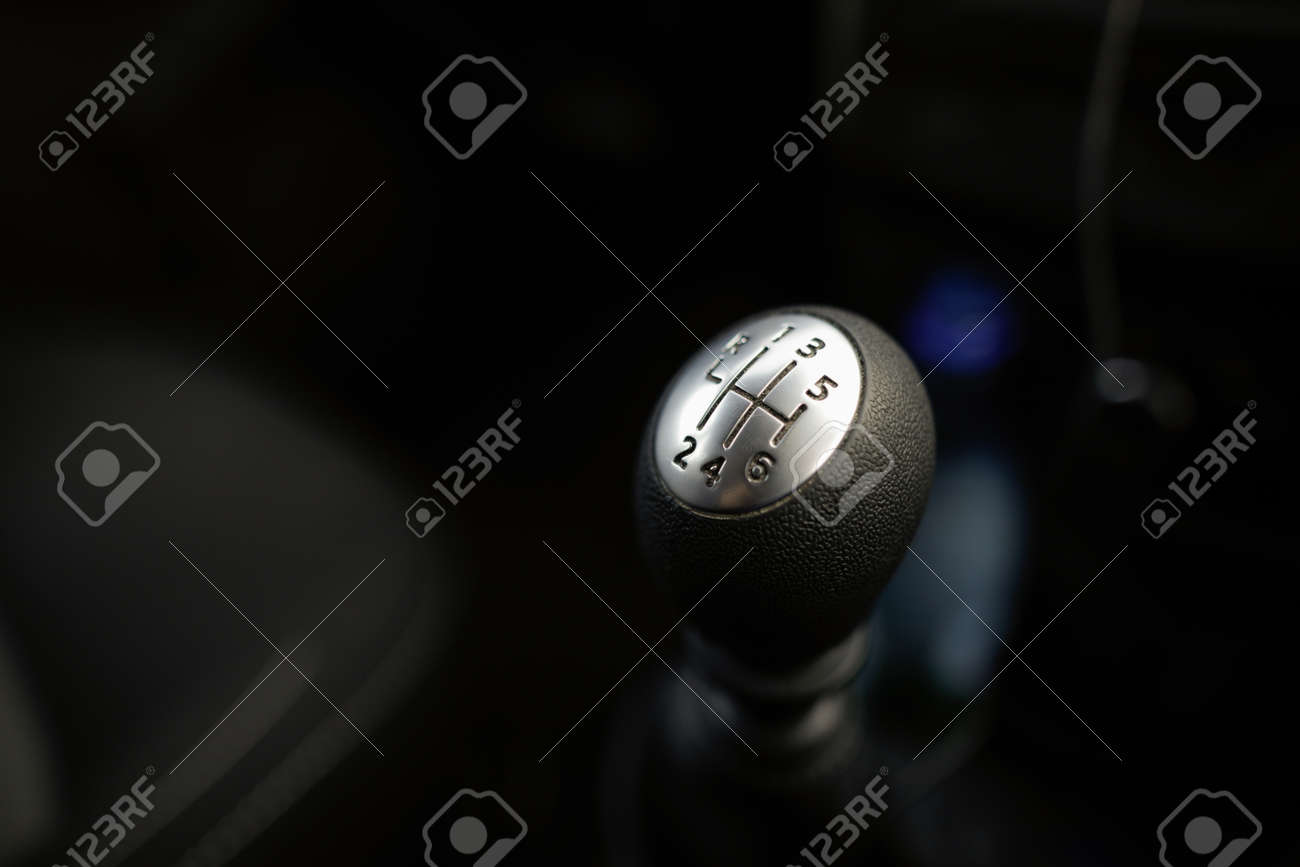 Details with a gear shift knob of a manual gearbox car - 167384770 Details with a gear shift knob of a manual gearbox car - 167384770