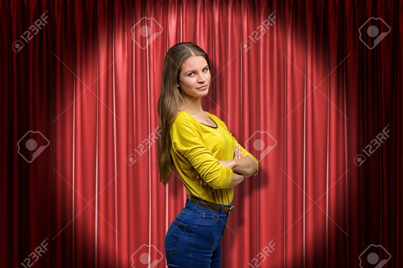 yellow jumper blue jeans