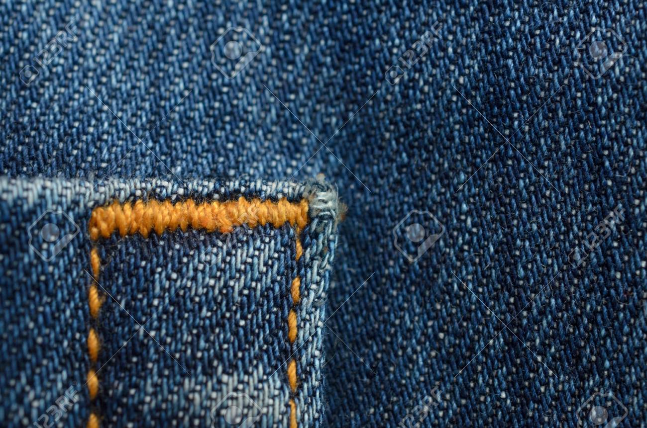 jeans with orange stitching