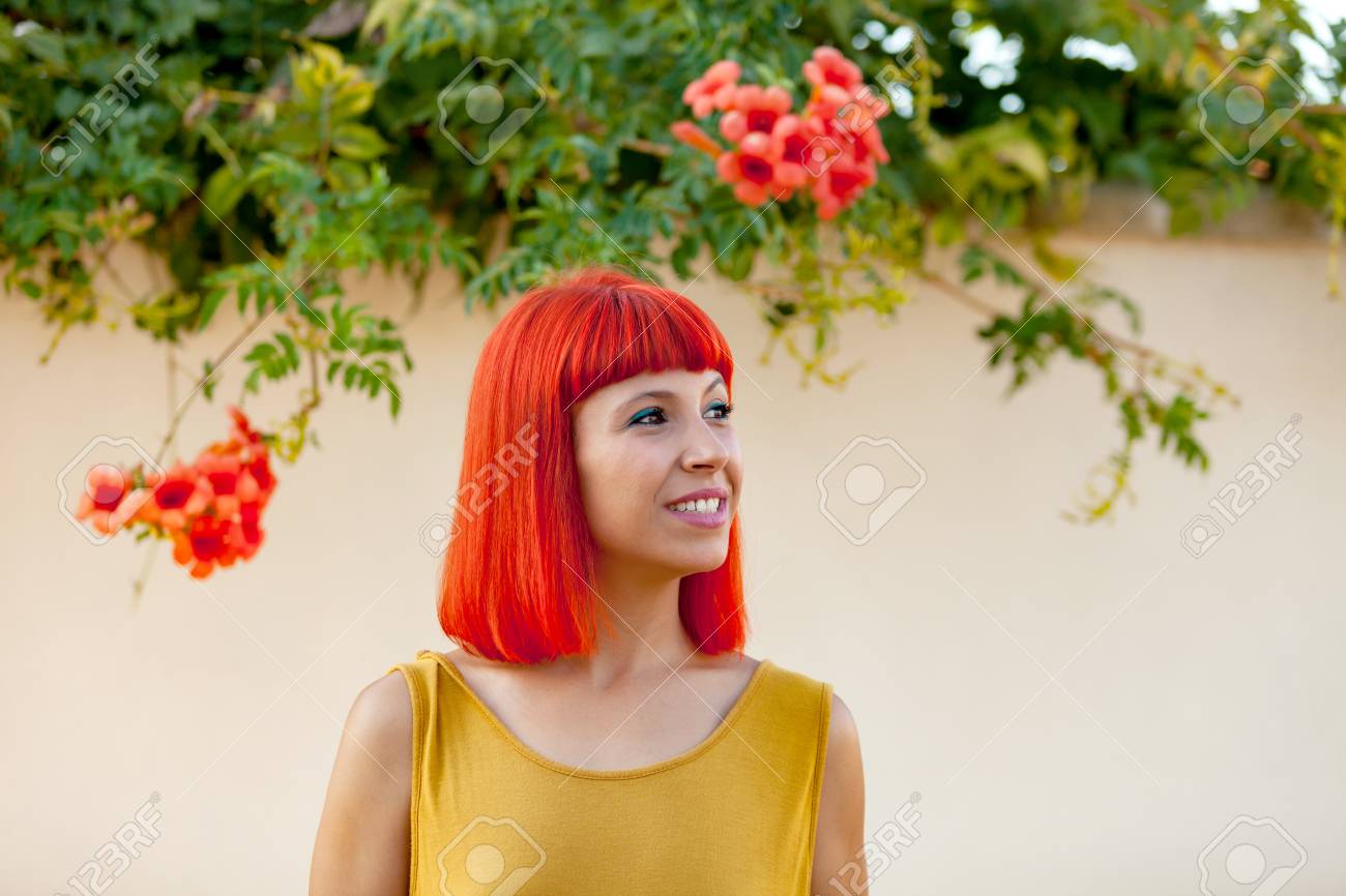 yellow dress with red flowers