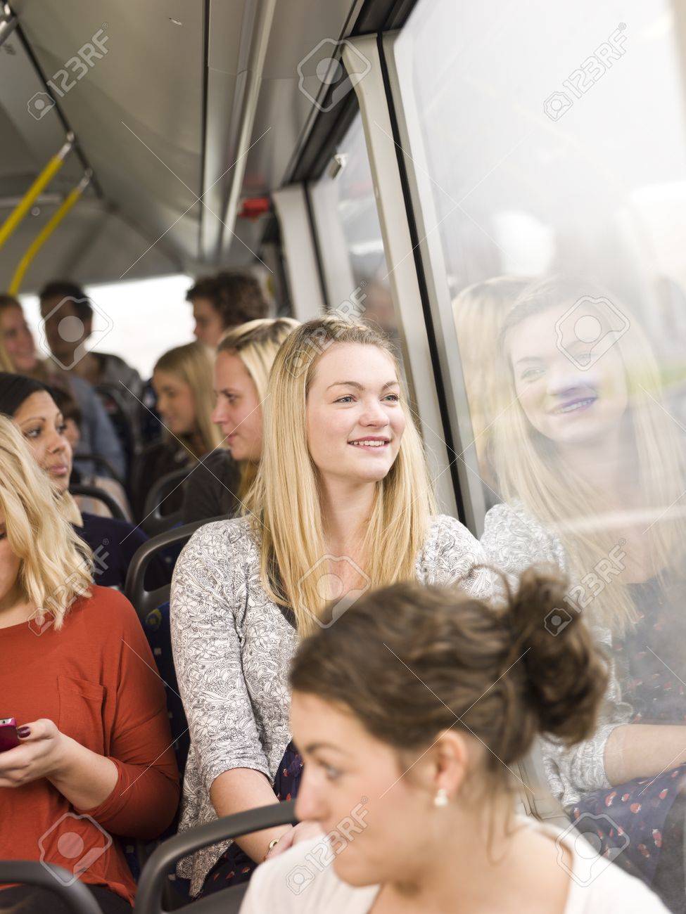 Happy woman on the bus - 11223926 Happy woman on the bus - 11223926