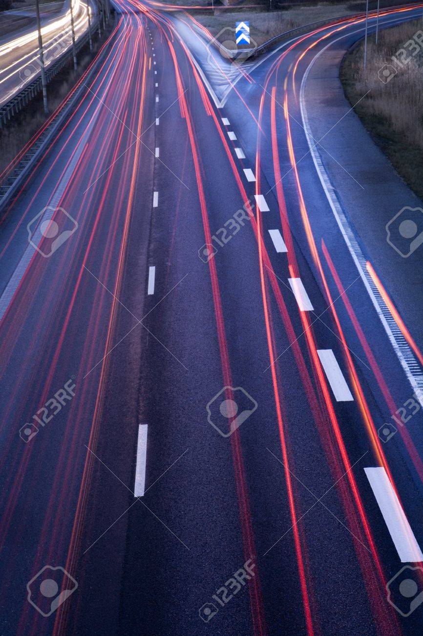 Highway with moving cars at dawn - 12844186 Highway with moving cars at dawn - 12844186