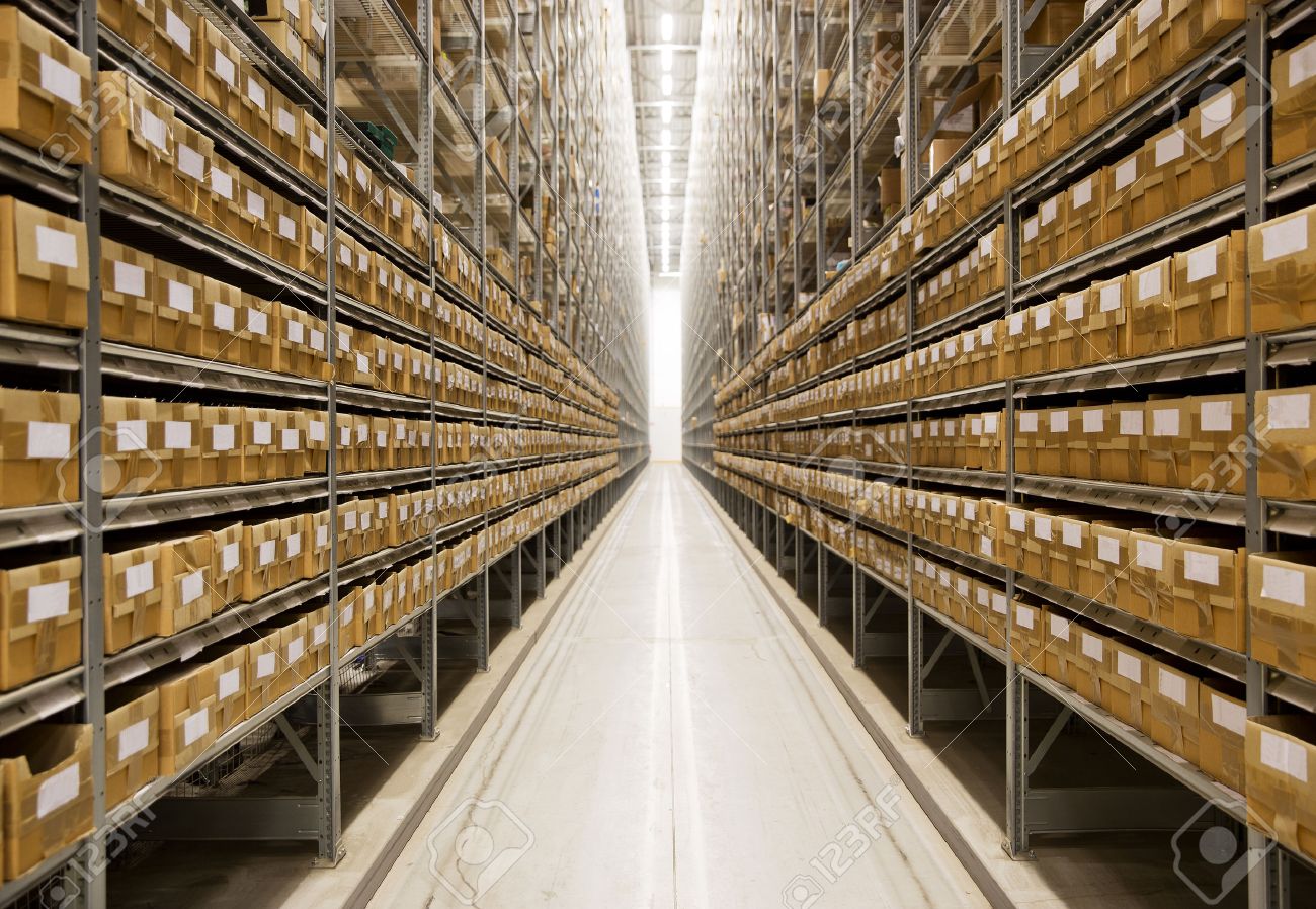 large group of cardboard boxes in a warehouse stock photo picture