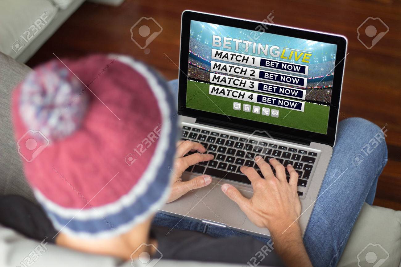 Young Man Betting Online In Laptop Stock Photo, Picture And Royalty Free Image. Image 60014779.
