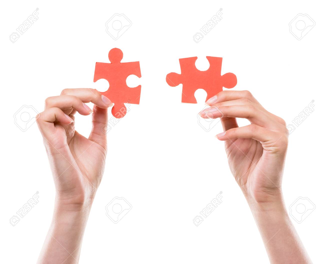 Close Up Of Hands Trying To Connect Small Jigsaw Puzzles Over White Background Stock Photo Picture And Royalty Free Image Image 40756102
